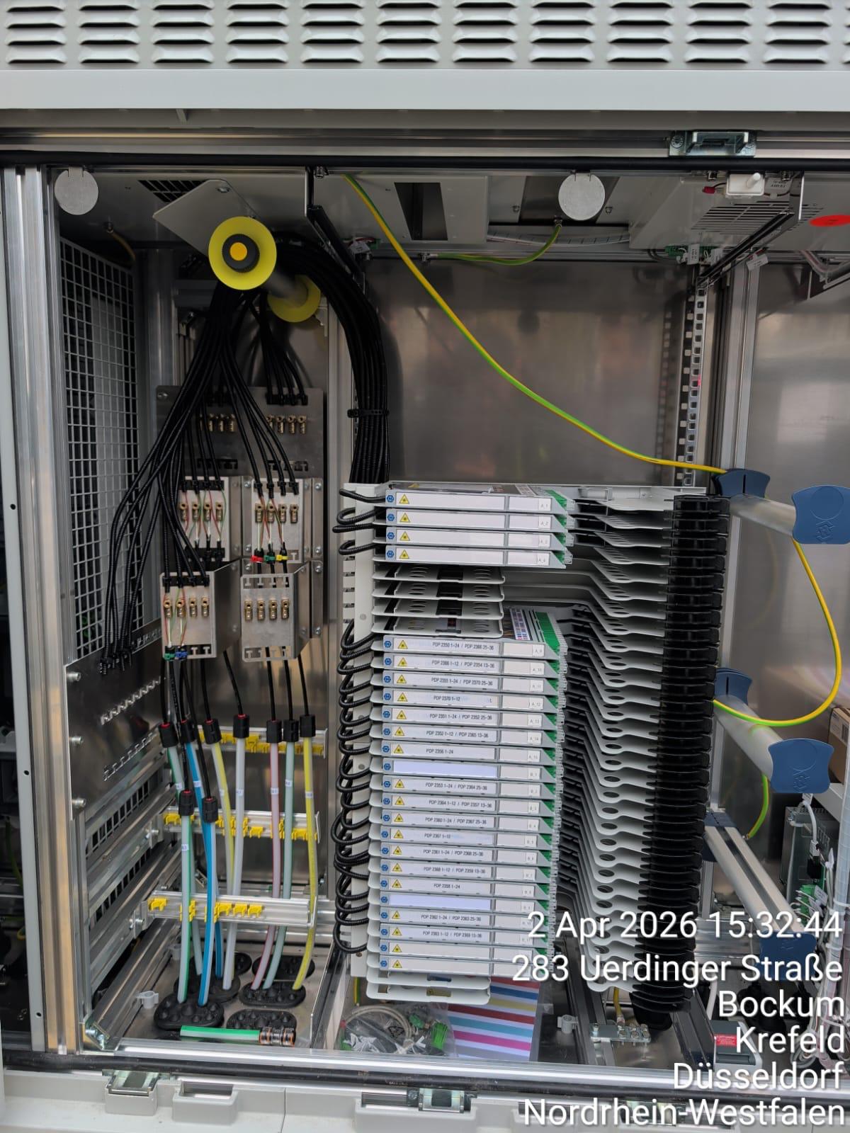 Krefeld OXG programme via Geodesia — MFG fiber cassette tray inside street cabinet, Bockum, 2026